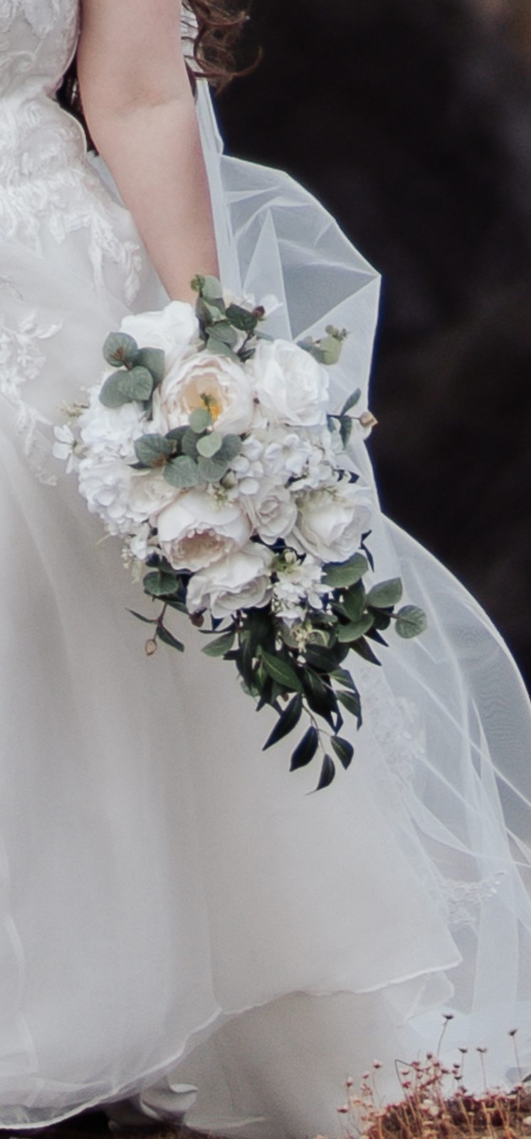 Cascading ivory rose and eucalyptus bridal bouquet